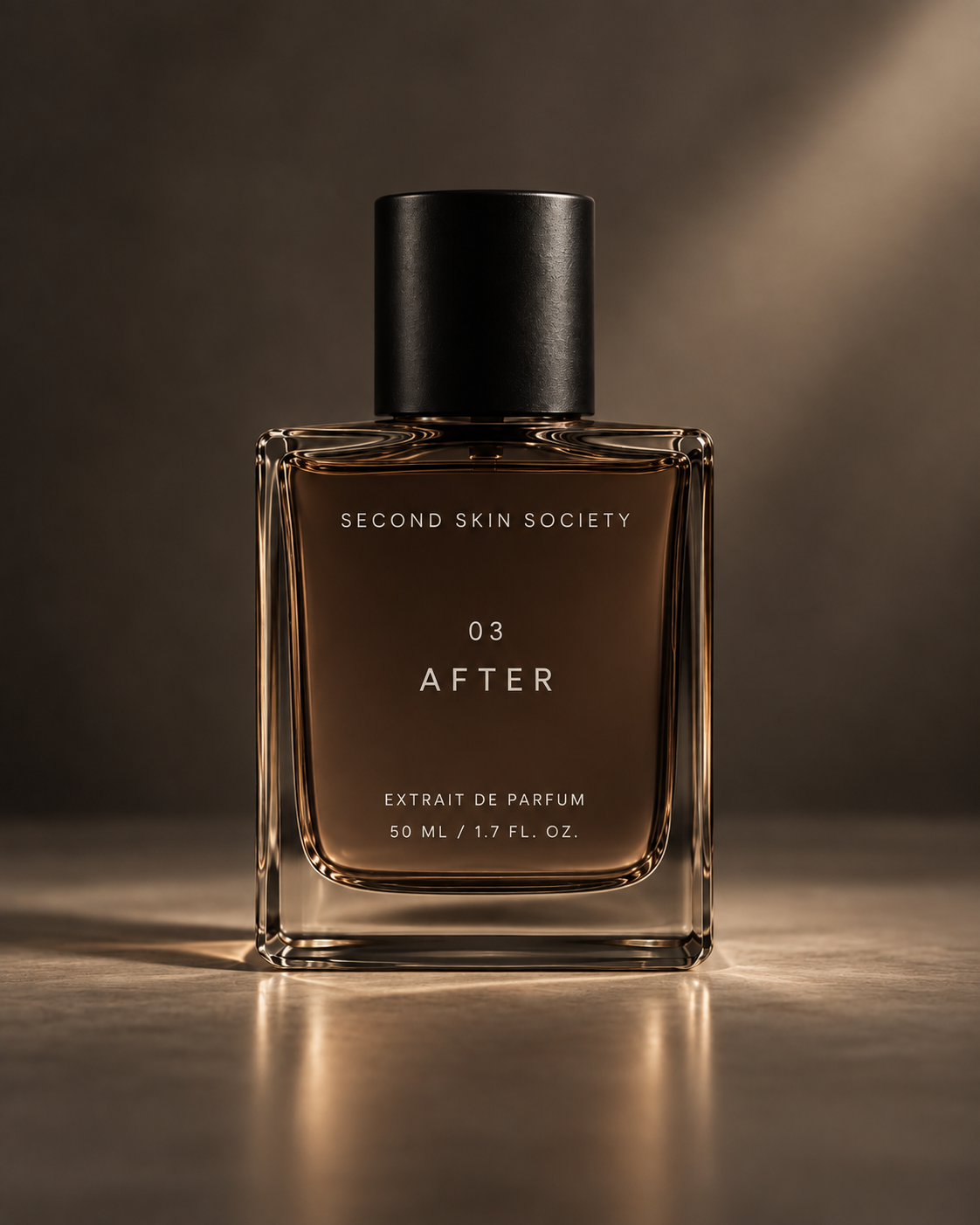 AFTER Extrait de Parfum bottle in low warm light